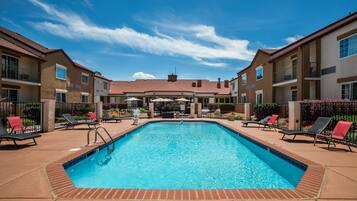 Seasonal outdoor pool, pool umbrellas, pool loungers