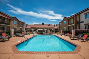 Seasonal outdoor pool, pool umbrellas, pool loungers