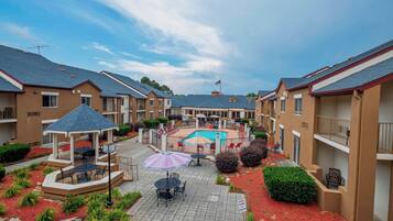 Seasonal outdoor pool, pool umbrellas, sun loungers