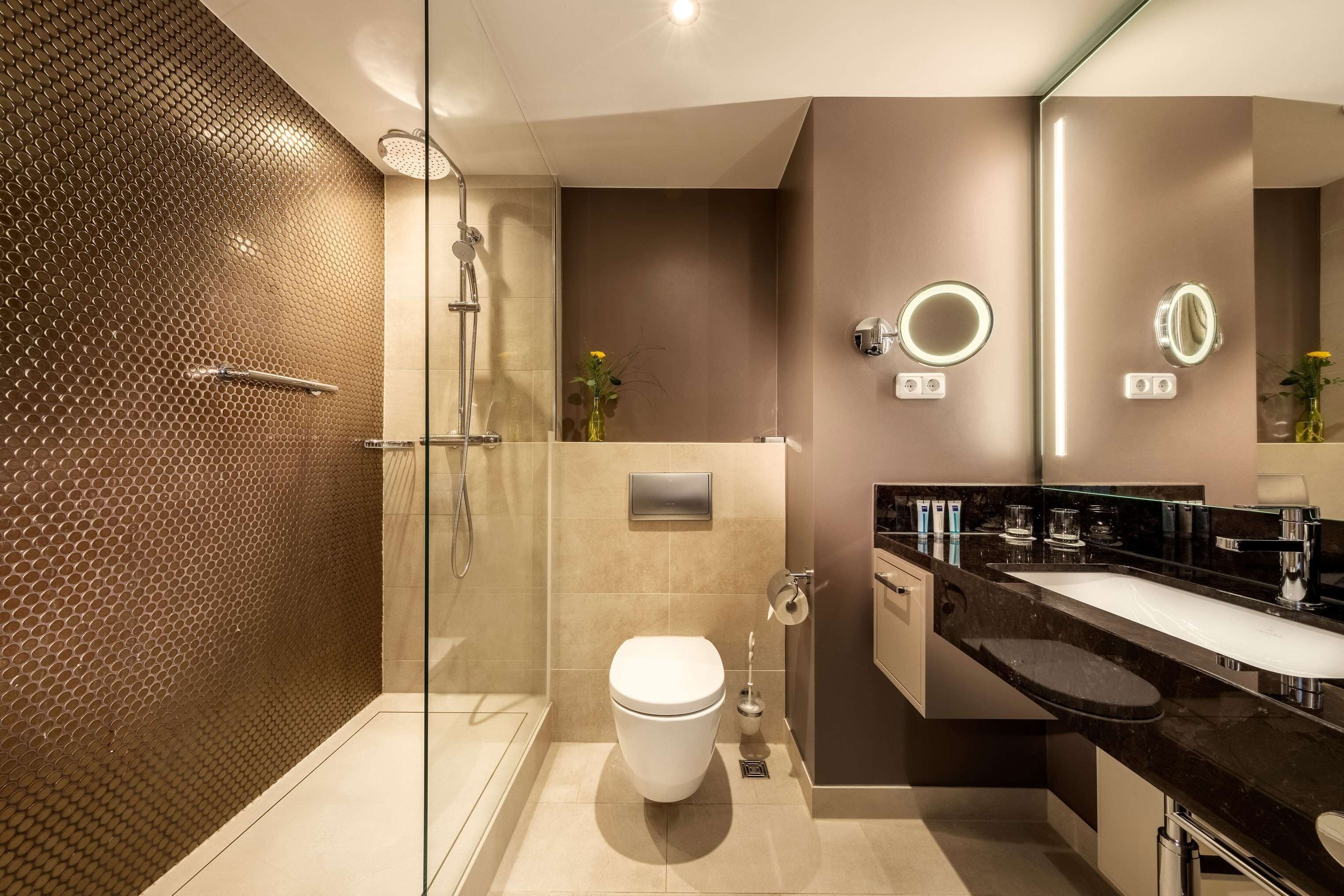 eco-friendly toiletries, hair dryer, bathrobes, towels