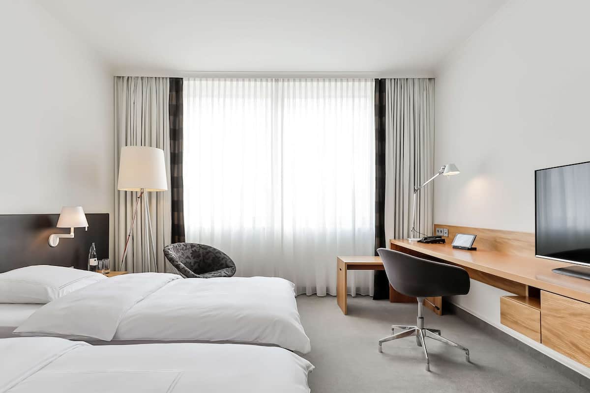 Hochwertige Bettwaren, Daunenbettdecken, Minibar, Zimmersafe