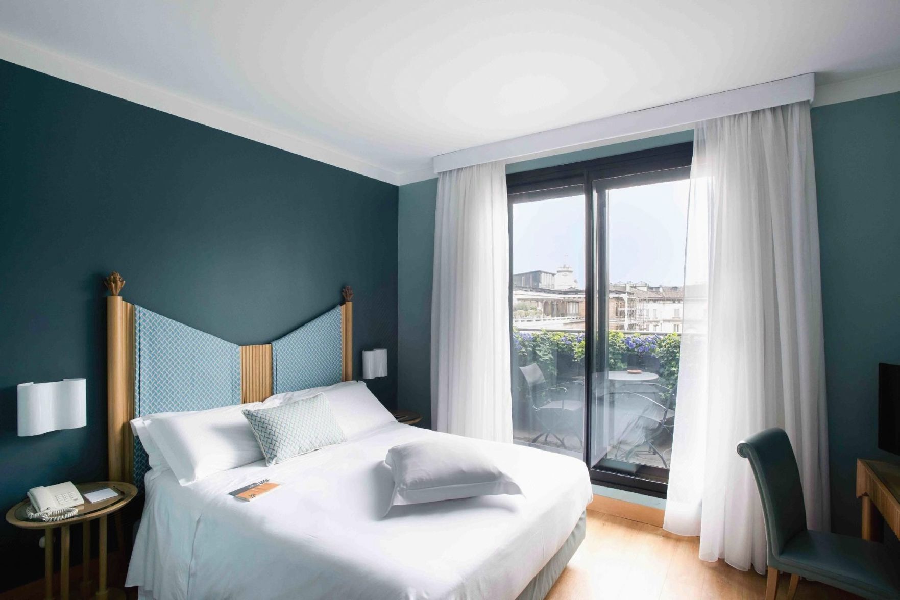 Hypo-allergenic bedding, down duvets, free minibar items, in-room safe
