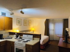 Deluxe Studio Suite - North building | Private kitchen | Fridge, coffee/tea maker, electric kettle