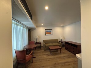 Renovated 1 Queen Bed Suite - Main Building | Living area | Flat-screen TV