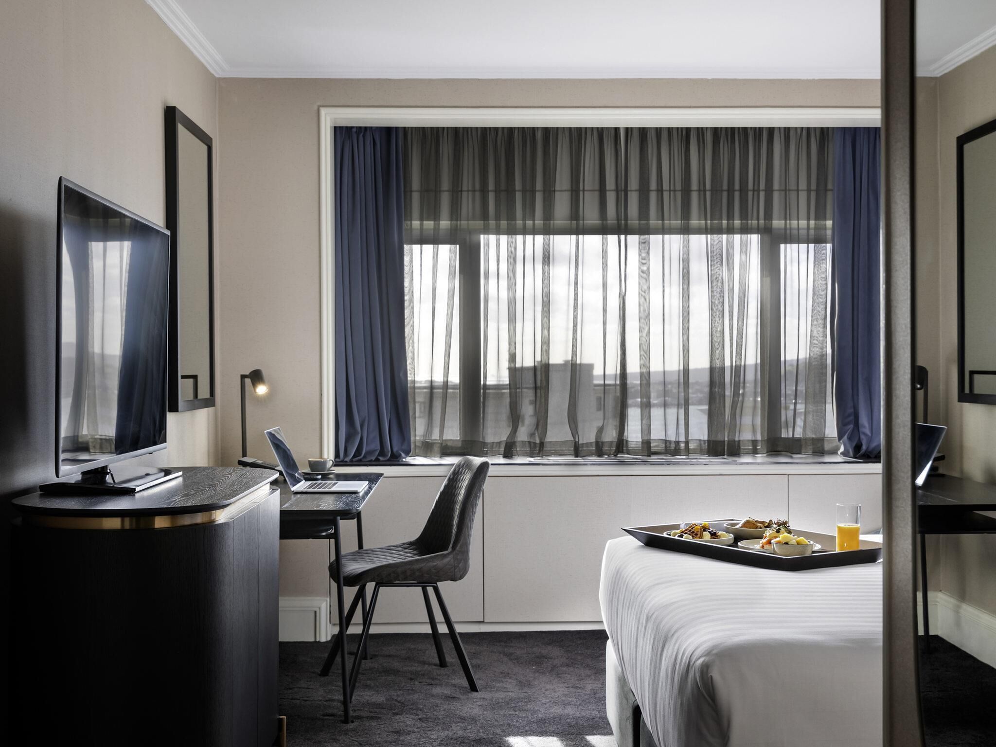 Habitación Deluxe, 1 cama King size | Ropa de cama de alta calidad y minibar 