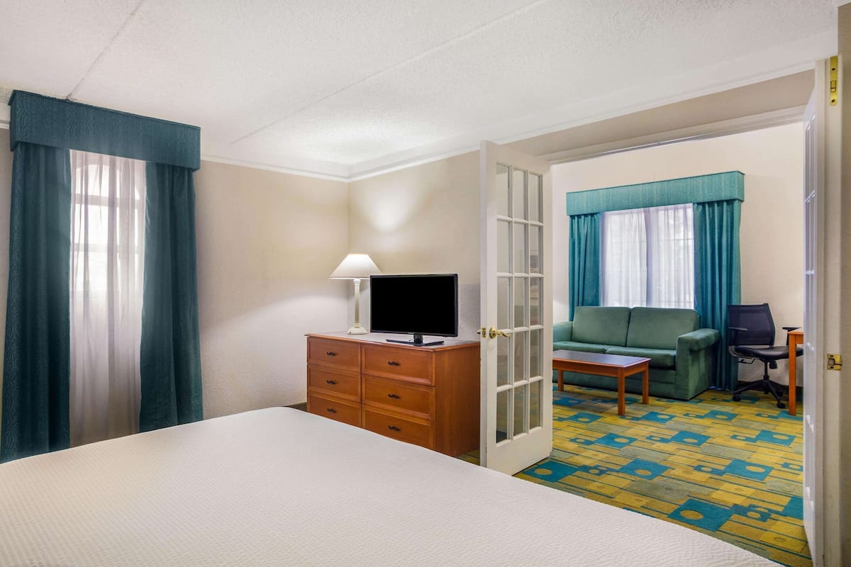 Pillow-top beds, desk, blackout curtains, iron/ironing board