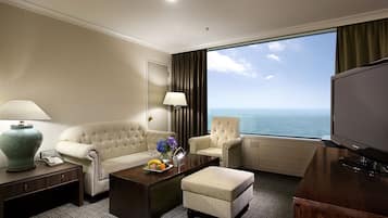 Suite, Ocean View, Corner | Free minibar items, in-room safe, desk, blackout drapes