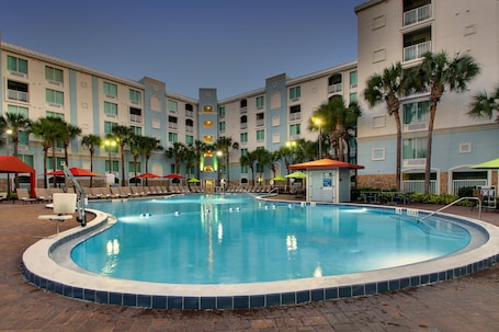 Outdoor pool, a heated pool, pool umbrellas, sun loungers