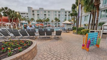 Outdoor pool, a heated pool, pool umbrellas, sun loungers