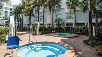 Outdoor pool, a heated pool, pool umbrellas, sun loungers