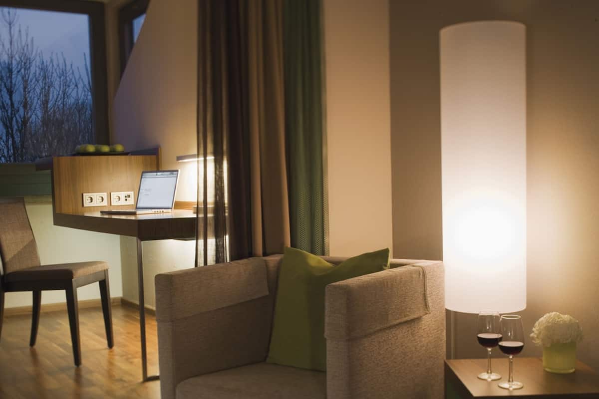 premium room, 1 king bed | living area | lcd tv