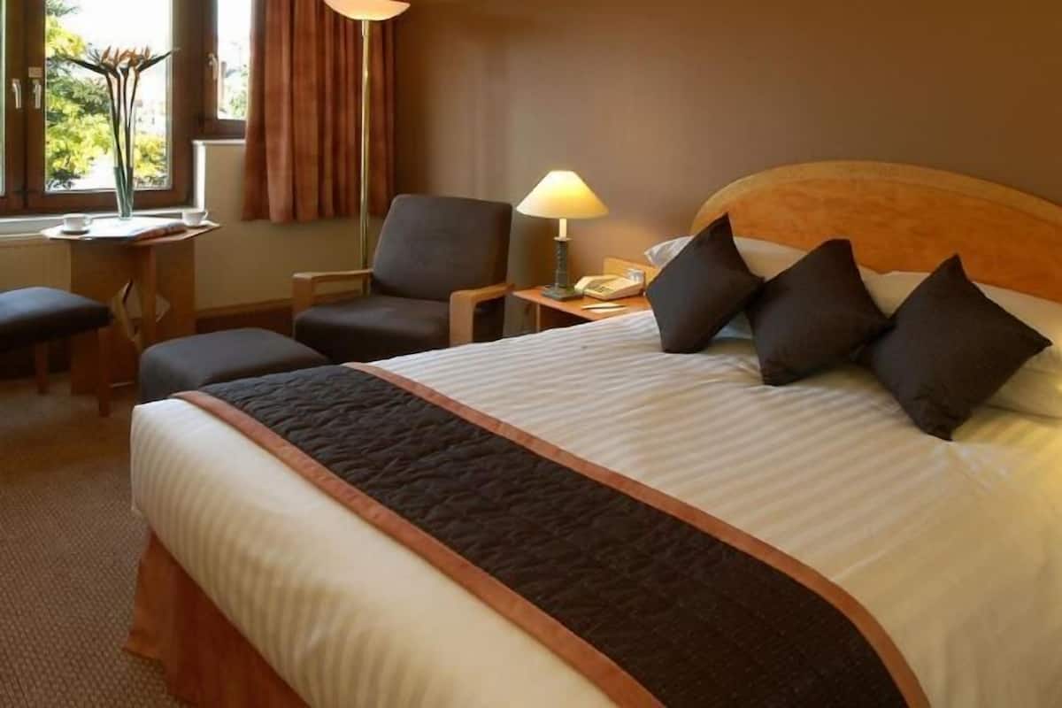 In-room safe, desk, blackout curtains, iron/ironing board