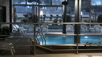 Indoor pool, open 10:30 AM to 1:30 PM, pool loungers