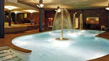 Indoor pool, open 10:00 AM to 1:30 PM, pool loungers