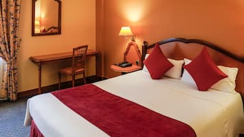 Cubrecamas, minibar, caja de seguridad en la habitación y escritorio