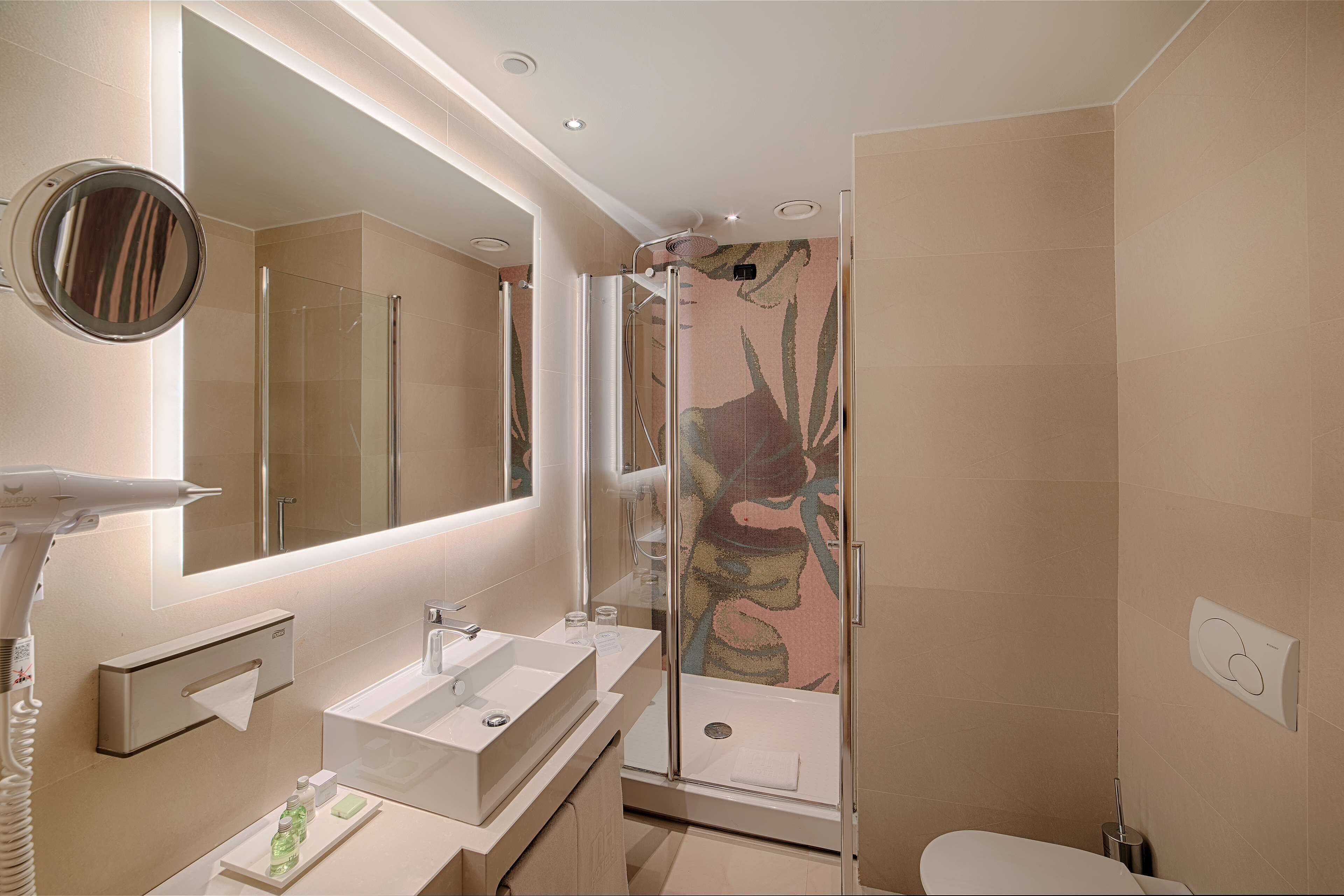 shower, eco-friendly toiletries, hair dryer, bidet