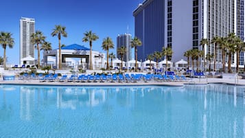 Outdoor pool, open 10:00 AM to 7:00 PM, cabanas (surcharge)