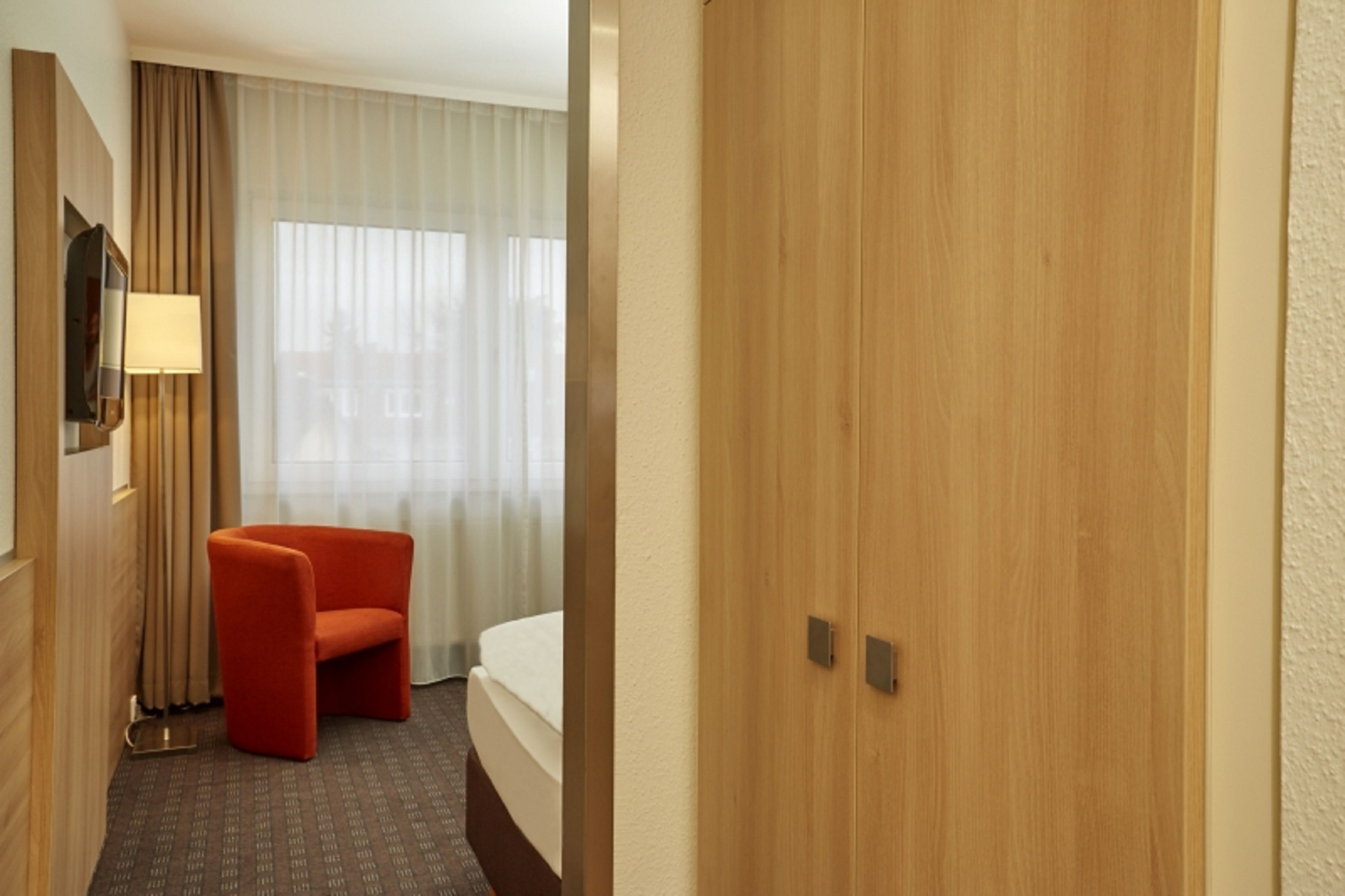 hypo-allergenic bedding, desk, blackout curtains, soundproofing