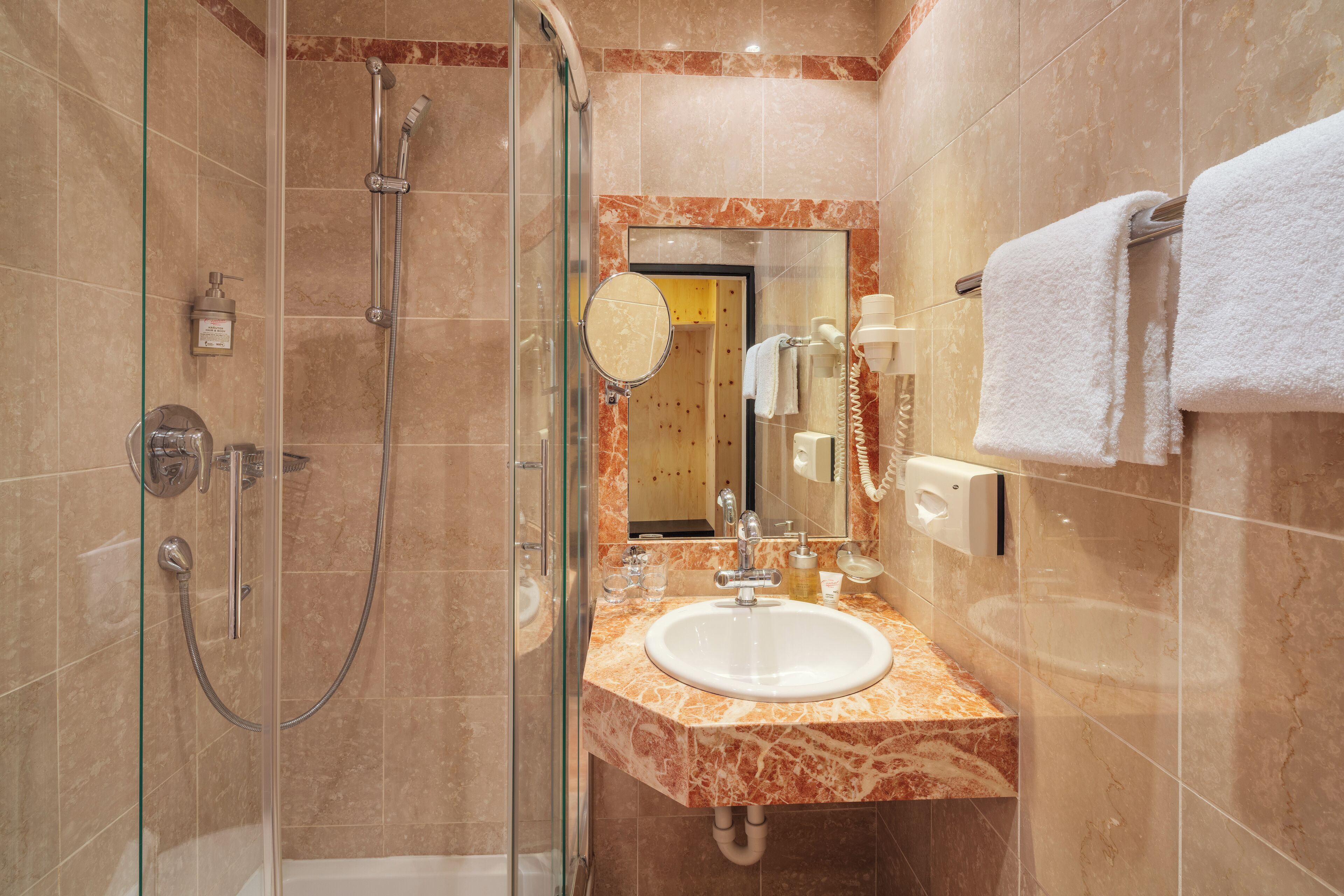 superior double room | bathroom | eco-friendly toiletries, hair dryer, towels