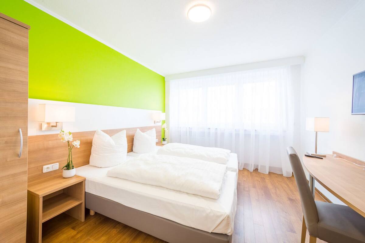 Down duvets, soundproofing, iron/ironing board (on request), bed sheets