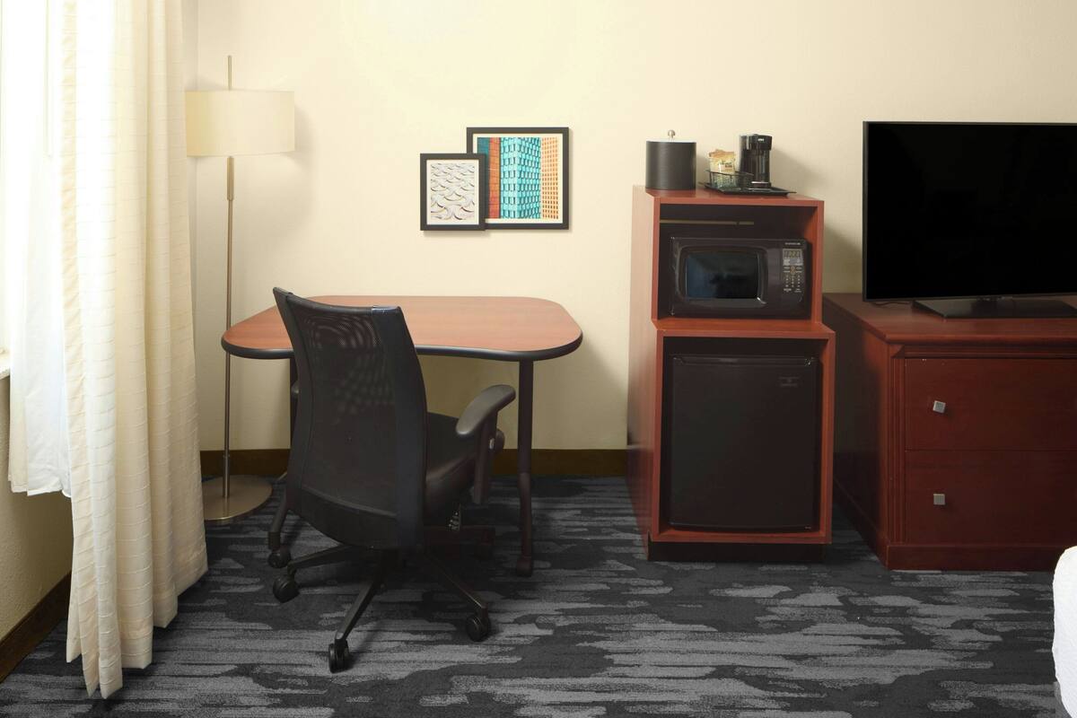 Premium bedding, down comforters, pillowtop beds, in-room safe