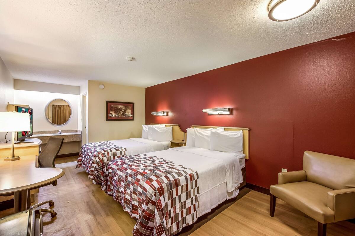 Desk, blackout drapes, cribs (free), WiFi (free)