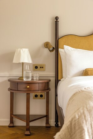 Classic Double Room | Minibar, in-room safe, desk, blackout curtains