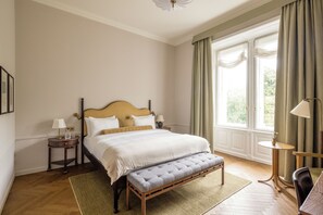 Deluxe Double Room | Minibar, in-room safe, desk, blackout drapes