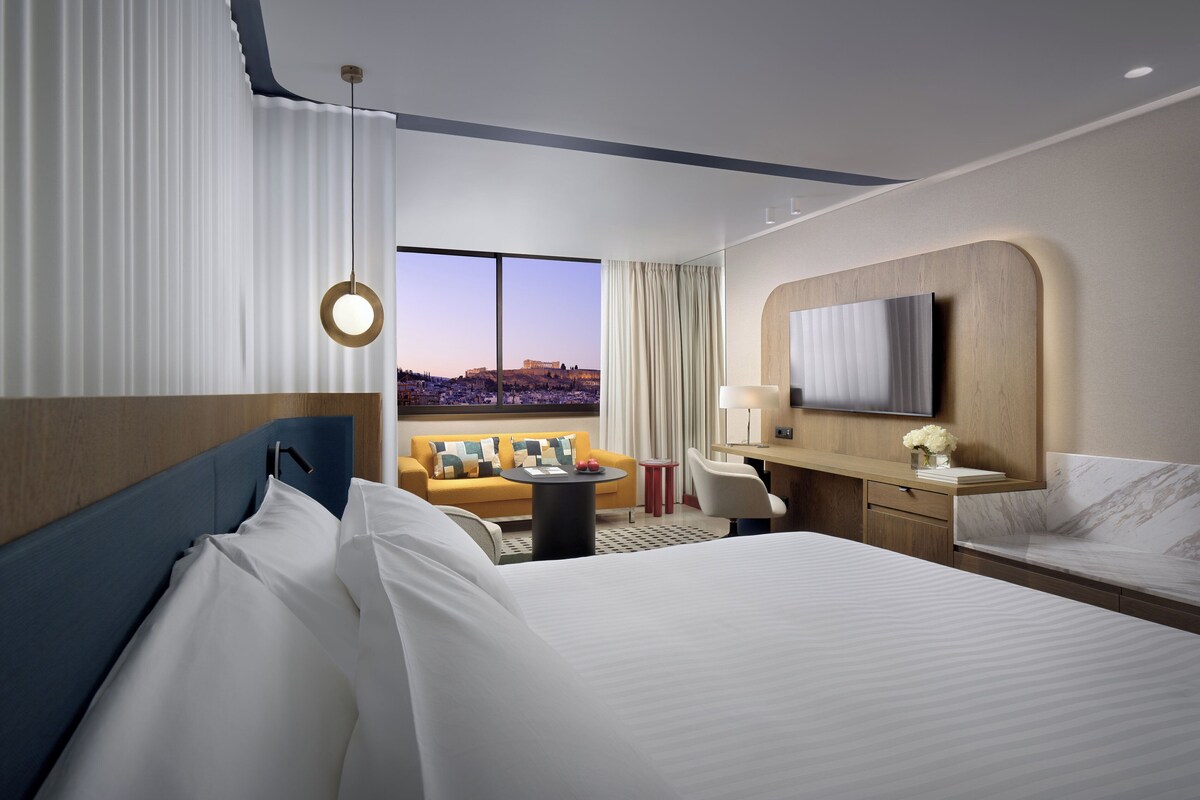 Classic Room, 1 King Bed (Acropolis View) | 1 bedroom, hypo-allergenic bedding available, down comforters, minibar