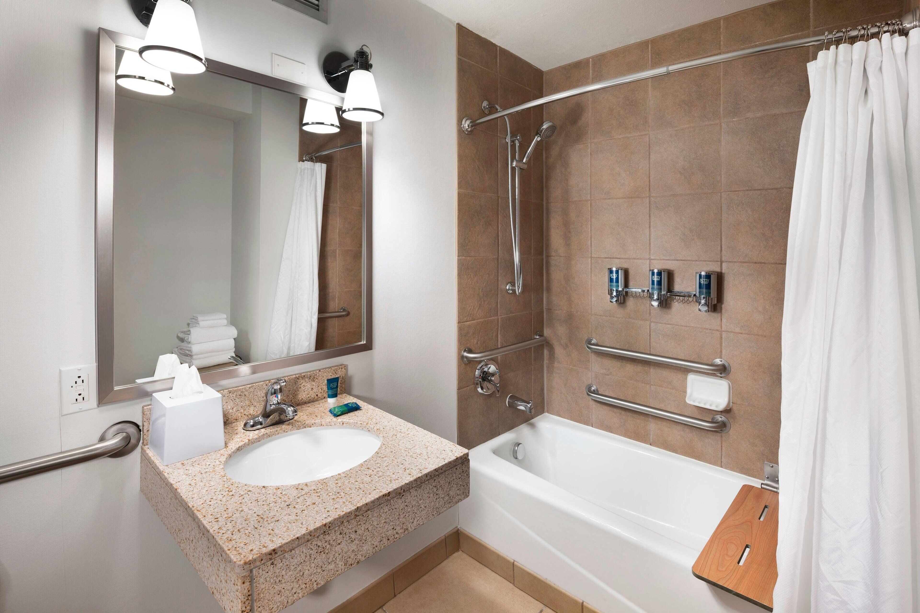 room, 2 queen beds (mobility accessible, tub) | bathroom | combined shower/bathtub, free toiletries, hair dryer, towels