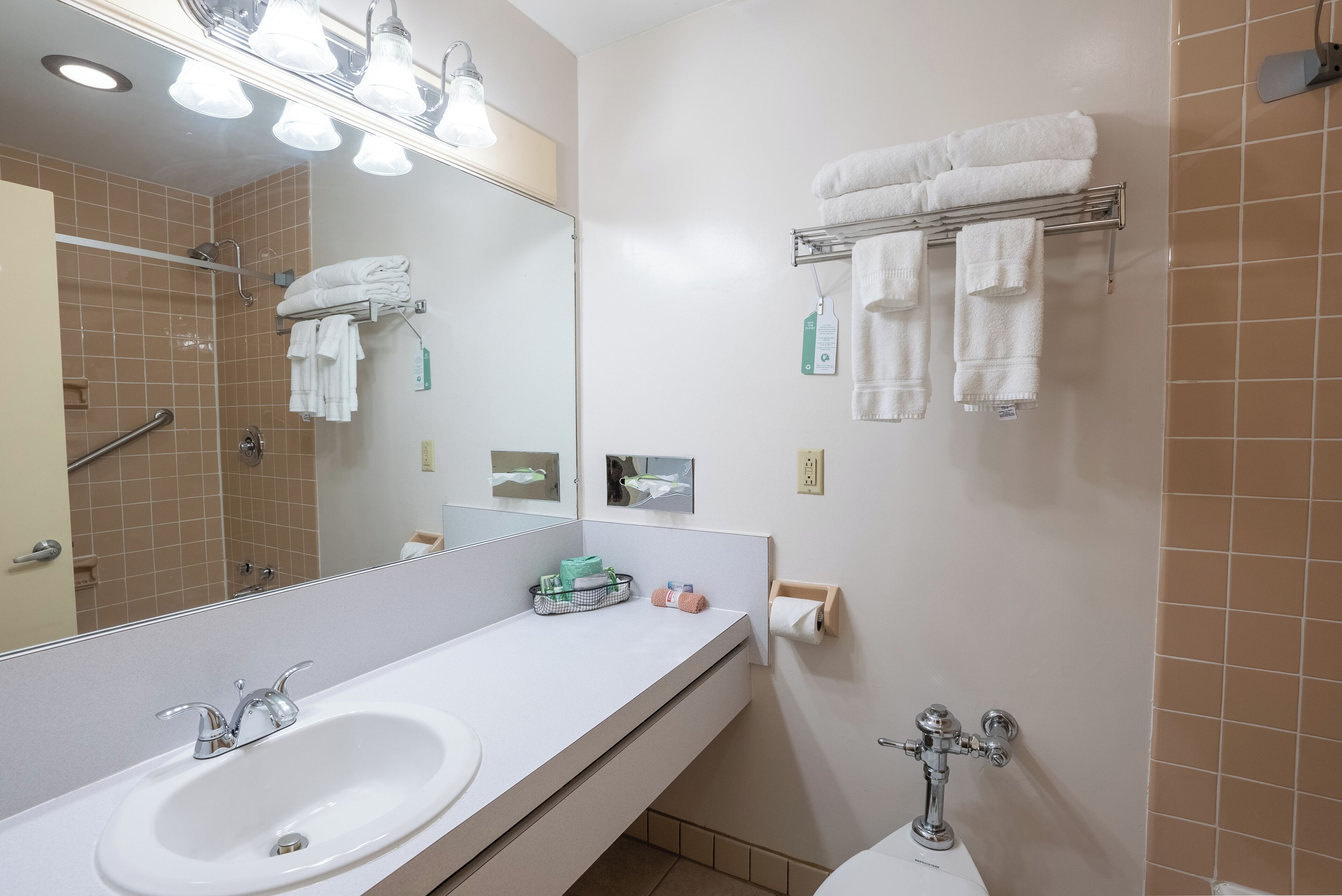 two queen beds fireplace | bathroom | combined shower/bathtub, free toiletries, hair dryer, towels