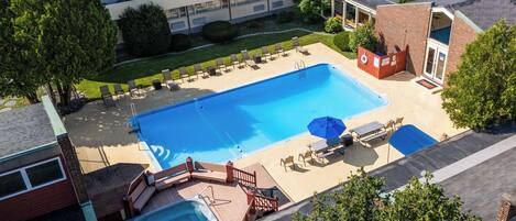 Seasonal outdoor pool, open 9:00 AM to 9:00 PM, sun loungers