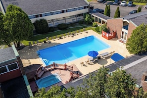 Seasonal outdoor pool, open 9:00 AM to 9:00 PM, sun loungers