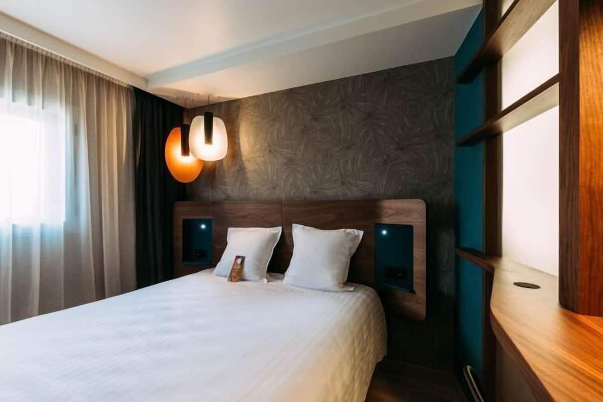 1 Schlafzimmer, hochwertige Bettwaren, Minibar, Zimmersafe