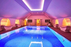 Indoor pool, open 7:00 AM to 8:00 PM, pool loungers