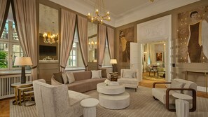 Executive Suite, 1 King Bed, City View | Living area | 55-inch LED TV with digital channels, streaming services, offices