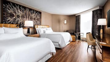Premium bedding, down comforters, pillowtop beds, in-room safe
