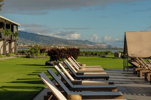 Outdoor pool, open 9:00 AM to 7:00 PM, pool umbrellas, sun loungers