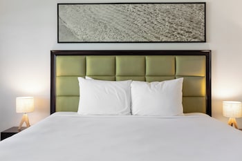 Room, 1 King Bed, Garden View | Desk, blackout drapes, iron/ironing board, free WiFi at Maui Seaside Hotel
