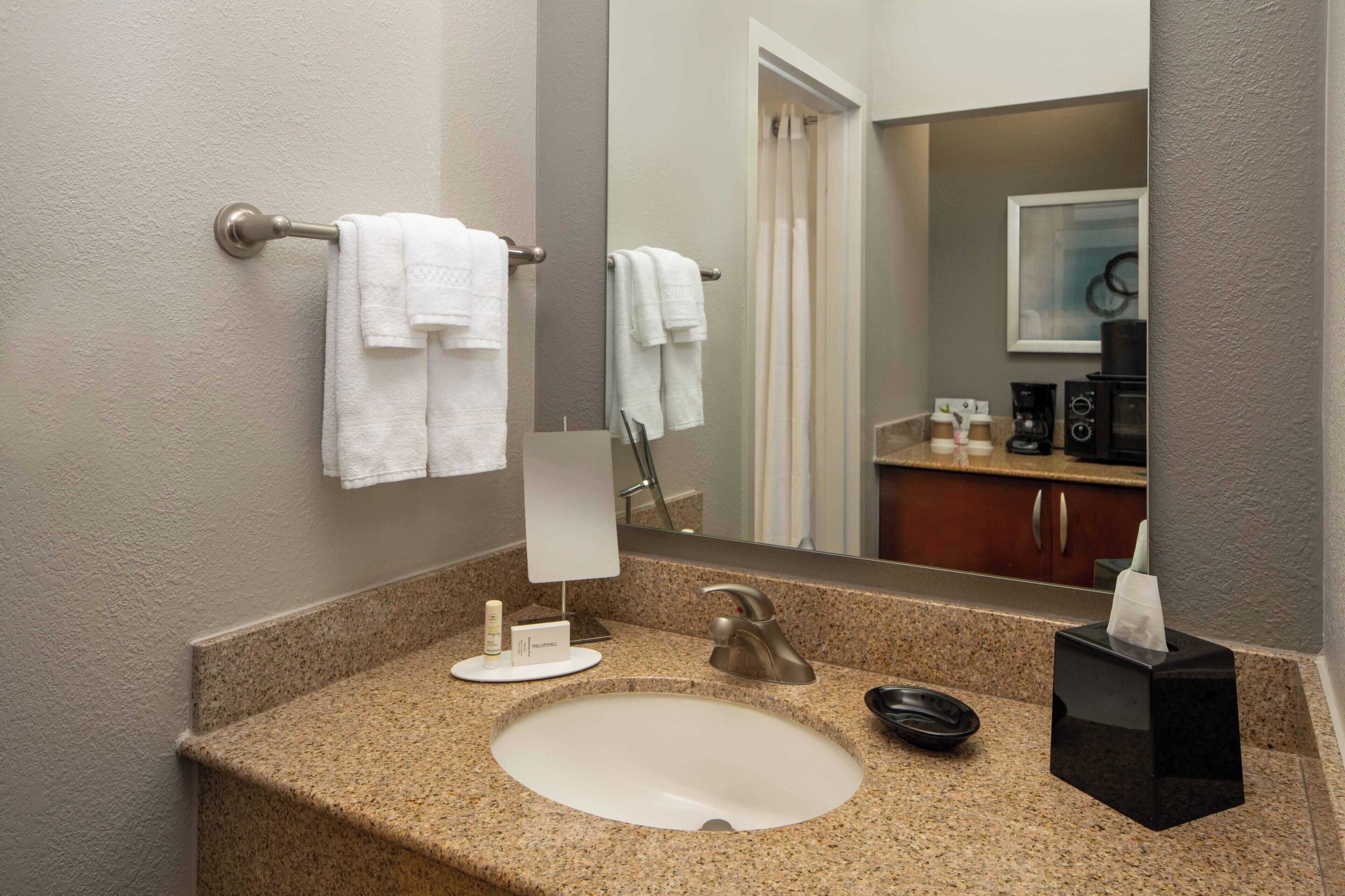 combined shower/bathtub, free toiletries, hair dryer, towels