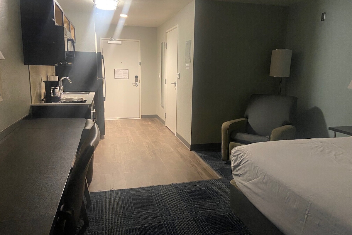 desk, laptop workspace, blackout curtains, iron/ironing board