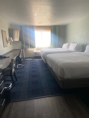 Room, 2 Double Beds, Non Smoking | Bathroom | Combined shower/tub, hair dryer, towels, soap