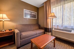 Suite, 1 King Bed with Sofa bed, Non Smoking | In-room safe, desk, laptop workspace, blackout drapes
