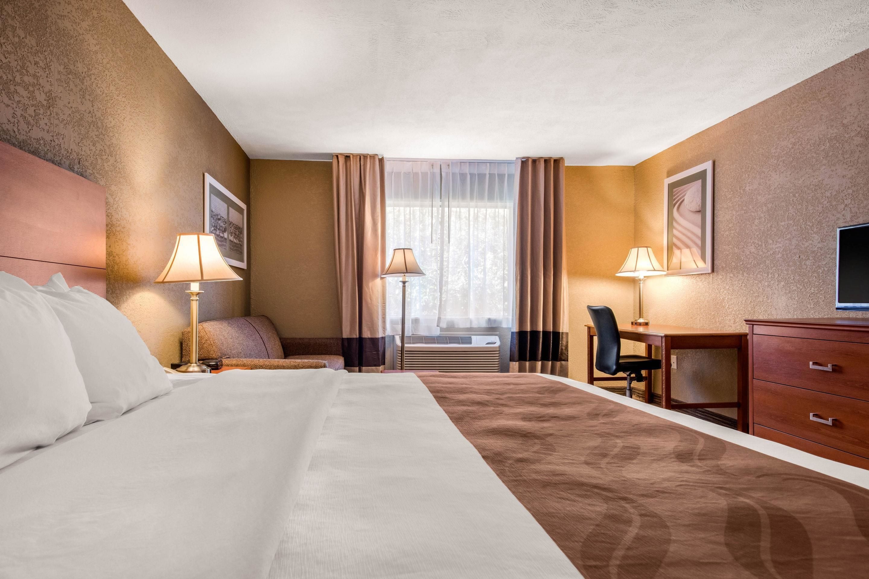 suite, 1 king bed with sofa bed, non smoking | in-room safe, desk, laptop workspace, blackout curtains