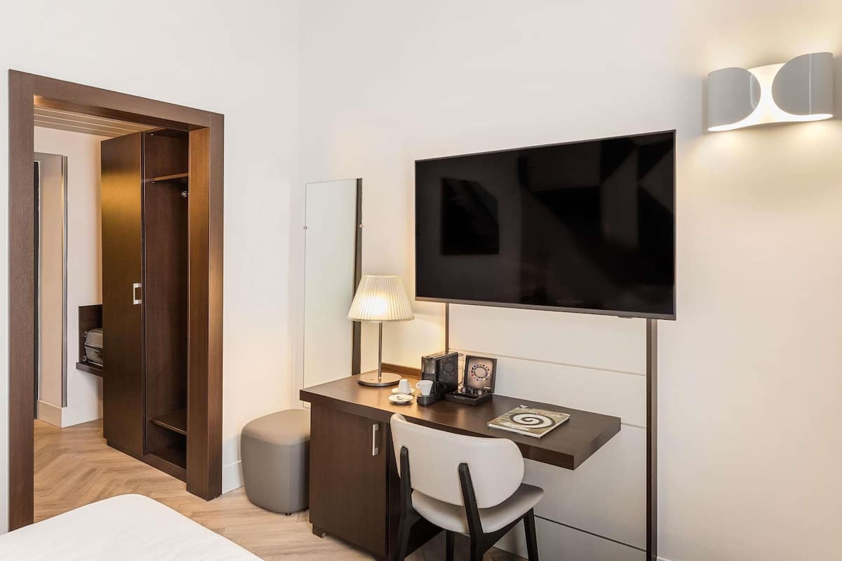 Ropa de cama de alta calidad y minibar