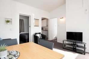 Standard Apartment, 2 Bedrooms | Living area | 30-inch LCD TV with cable channels, TV