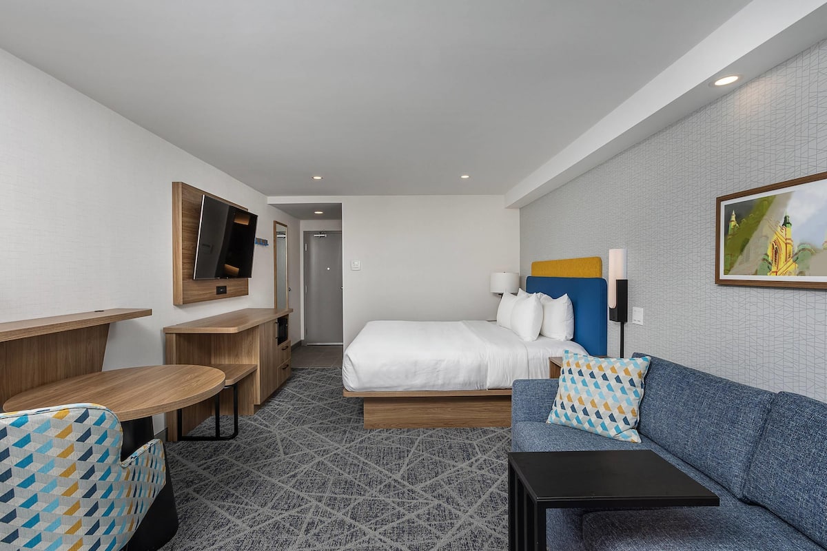 Premium bedding, pillow-top beds, desk, blackout curtains