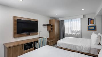 Premium bedding, pillow-top beds, desk, blackout curtains