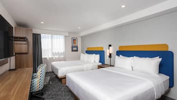 Premium bedding, pillow-top beds, desk, blackout curtains