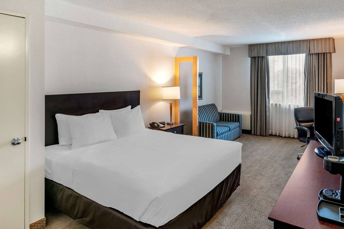 Premium bedding, pillow-top beds, desk, blackout curtains